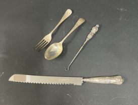 A silver spoon, Sheffield, circa 1912-13 together with a silver fork, silver handle hook and