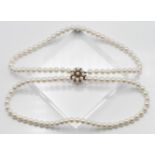 A two row uniform cultured pearl necklace, approx. Pearl size: 8.00mm, approx. length: 42cm, with