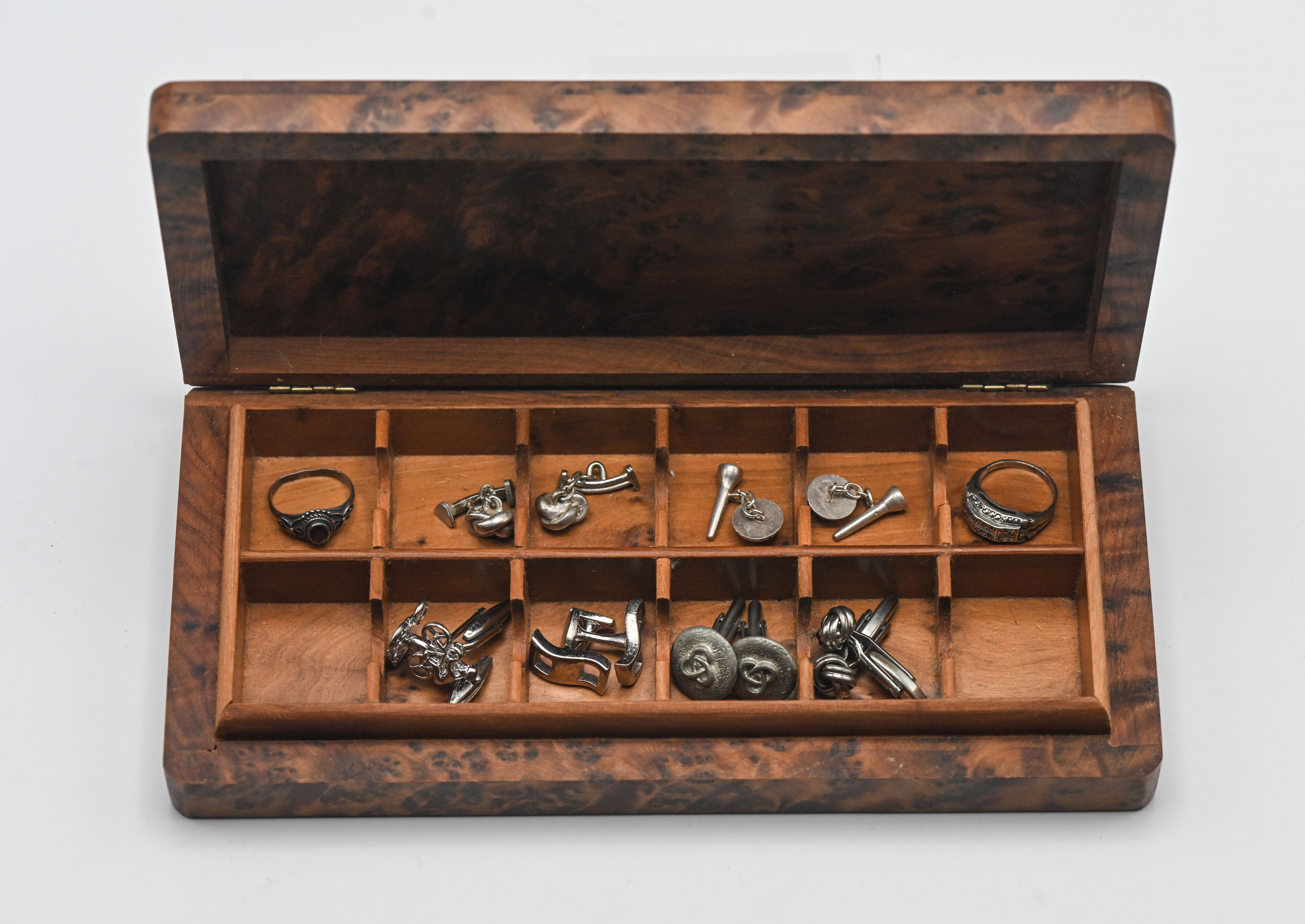 Two silver dress rings and a collection of various silver and white metal gents cufflinks