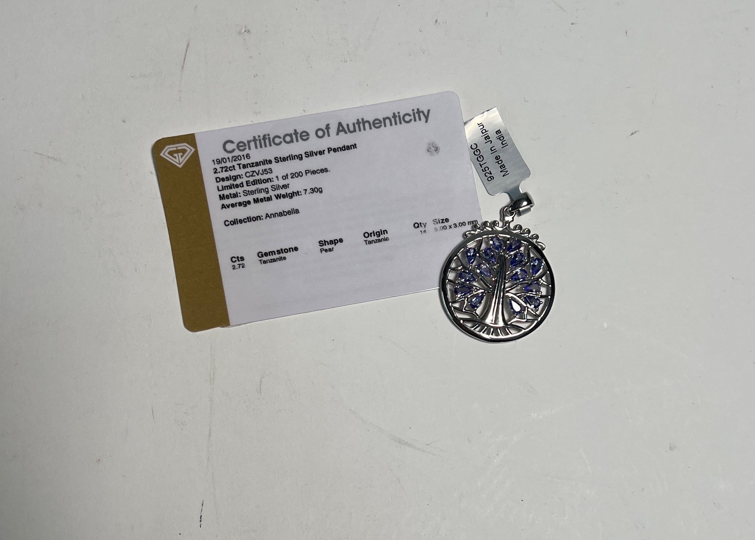 A silver and tanzanite pendant, with certificate of authenticity.