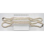 Two matching pair of single row uniform cultured pearl necklaces, approx. length: 46cm, pearl
