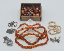 Costume jewellery, necklaces, box of various beads, amber?