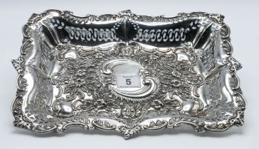 An Edwardian rectangular silver and pierced shallow dish, decorated with embossed flowers and