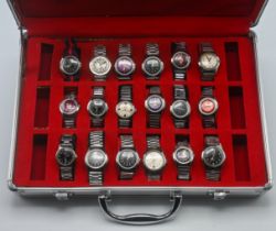 A suitcase containing a collection of 18 various West End Watch Co. midsize wristwatches various