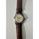 Rolex, a 1946 stainless steel Oyster wristwatch, the dial with arabic gilt numerals