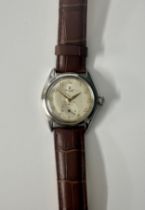 Rolex, a 1946 stainless steel Oyster wristwatch, the dial with arabic gilt numerals