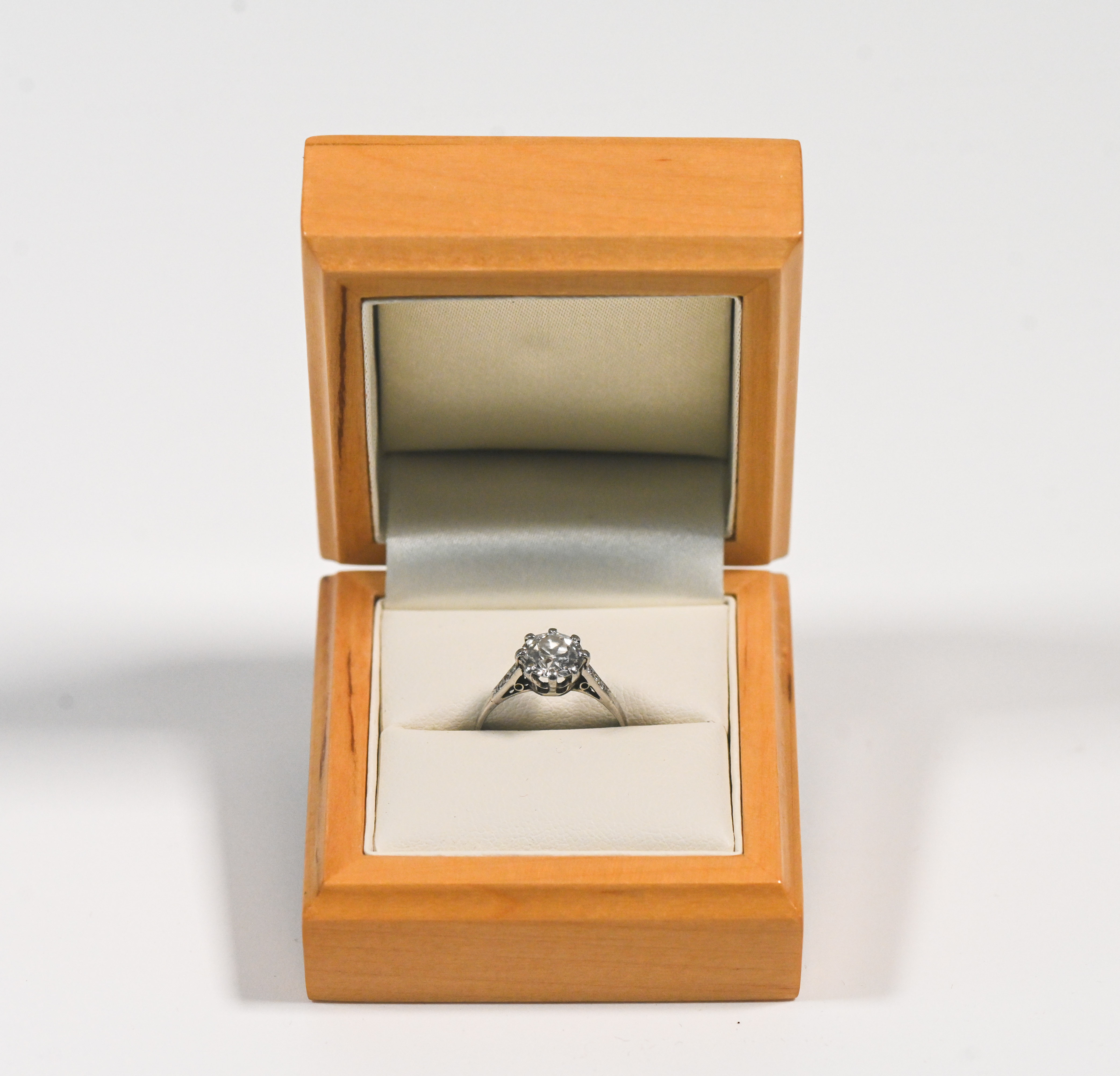A fine diamond and platinum solitaire ring, set with an old brilliant cut diamond