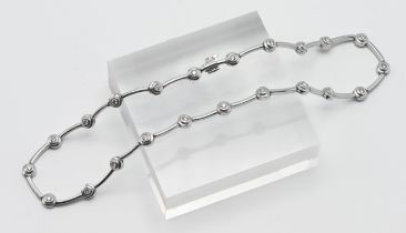 Bernstones- a 14k white gold and diamond set necklace, boxed, approx. 27.9g.