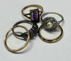 Five various rings including two 9ct bands 4.3g, 9ct stone set ring 2.2g and two other dress rings