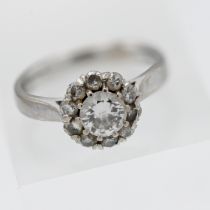 An 18ct white gold and diamond set cluster ring, size K.