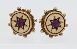 A pair of 9ct gold and ruby earrings, 2.70g.