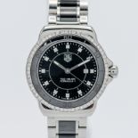 Tag Heuer, a ladies Formula 1 diamond dot and bezel date wristwatch, model number WAH1312, serial