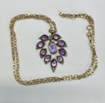 A stylish amethyst and gold necklace