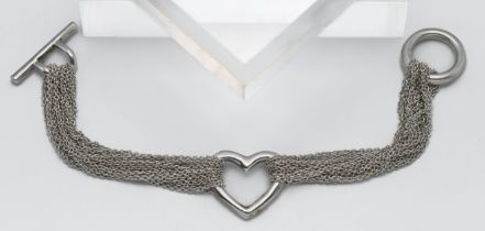 Tiffany & Co silver heart bracelet, with box and pouch.