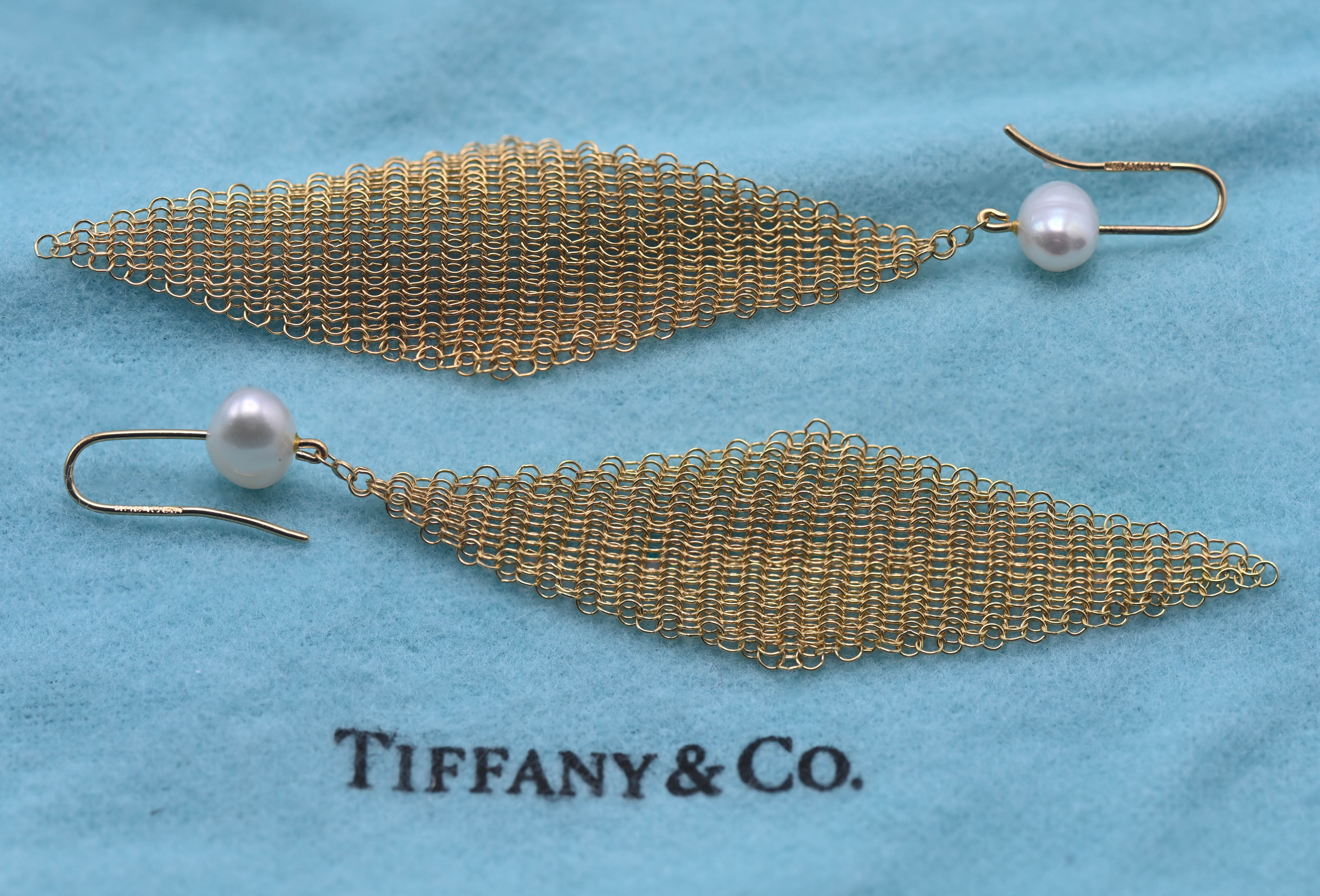 Tiffany & Co 18ct yellow gold and pearl earrings by Elsa Peretti, with box and pouch.