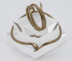 A 9ct gold snake necklace set with ruby eyes together with a matching snake bracelet also set with