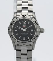 Tag Heuer, a ladies Aqua racer stainless steel wristwatch, number WAF1410, RRR5399, with small box.