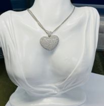 A Chopard style diamond heart pendant necklace set with approx. 5.28ct of diamond, circa 2007, set