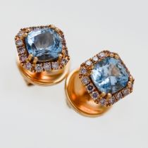 A pair of 18ct rose gold diamond and aquamarine stud earrings.
