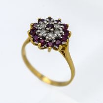 An 18ct ruby and diamond cluster ring, size Q.