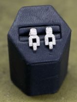 A pair of Art Deco style diamond set earrings, length approx. 15mm.