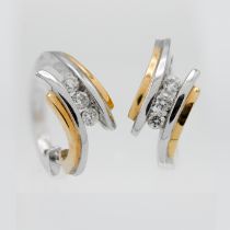 Iliana- an 18k white and yellow gold pair of hoop earrings, approx. 5.5g.