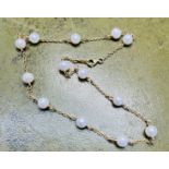 An 18ct natural pearl set necklace, approx. 8.80g,