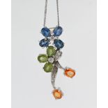 A 9ct white gold multi gem stone and diamond pendant on chain.