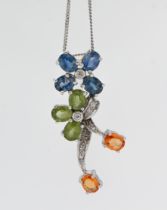 A 9ct white gold multi gem stone and diamond pendant on chain.