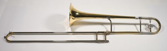 A Trombone 5677264 King Legend 2B Tenor, and stand, with two Bell lyre mounted music stands.