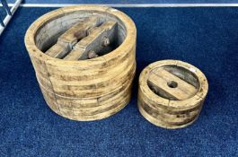 Two Victorian cart wheels, 38cm and 25cm diameter.