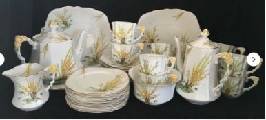 Royal Stafford bone china tea service decorated in the 'Broom' pattern.