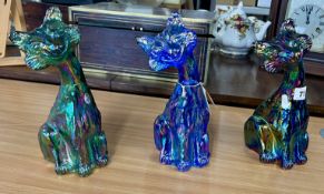 Three Fenton Ware carnival glass cats, height 28cm.