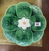 A majolica style leaf dish, pair of porcelain bisque Austrian figures, single Royal vase and a