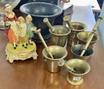 A collection of six chemist brass pestle and mortars, including a large 19th century large bronze