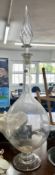 A huge 19th century chemist shop display carboy in clear glass, with stopper, height 117cm.
