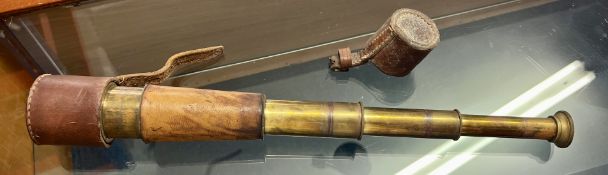 A 2 pull vintage telescope with leather case.