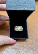 A 9ct dress ring, possibly Moissanite, size P/Q, approx 6.1g.