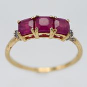 A silver ring set with African ruby and diamond, Asscher cut stones and baguette diamonds, gold