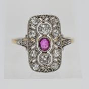 An antique 18ct ruby and diamond set ring, head size 18mm x 11cm.