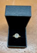 An 18ct cluster ring, approx 2.8g, size J.