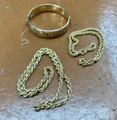 Two 9ct gold rope twist chains, approx 15.1g together with 9ct metal core bangle.