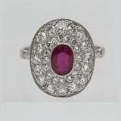 A good ruby and diamond cluster ring set in probably white gold, head size 16mm x 12mm.