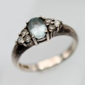 A silver aqua marine gem set ring (misshaped).