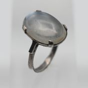 A moonstone set ring, not hallmarked, size J.