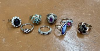 Four 9ct gold dress rings, approx 13.93g together with four silver dress rings.