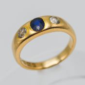 An 18ct gold sapphire and diamond ring, size Q.