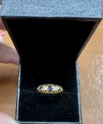 An 18ct gold diamond and sapphire ring, approx 4.1g, size O.