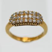 A Victorian 18ct ring set with twenty five diamonds, size N.
