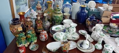 A quantity of mainly reproduction Chinese porcelain, to include a pair of lions, two figures, vases,